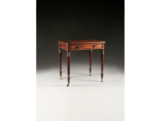 A Gillows Regency mahogany writing table, of small proportions