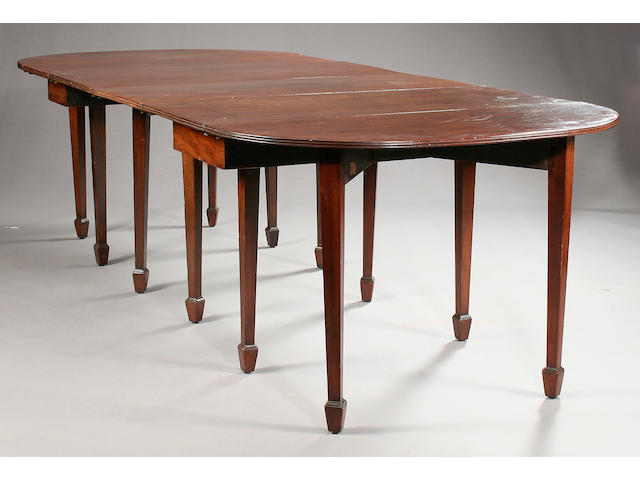 A George III mahogany 'D' end dining table