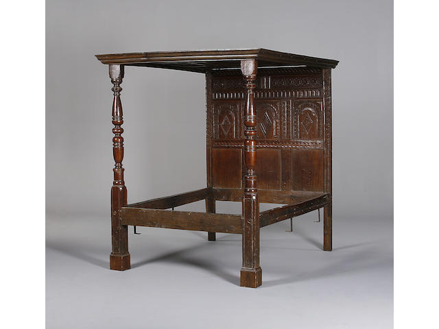A 17th century and later oak tester bed