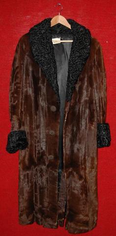 Dirk Bogarde from The Fixer, 1968 A three quarter length mink fur coat,