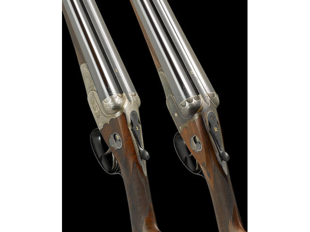 A fine composed pair of 12-bore 'Royal Unique' self-acting boxlock ejector guns by W.W. Greener, no. 55417 and 65204 No. 1 in a W.W. Greener brass-mounted leather case with green velvet lining,  No. 2 In a W.W. Greener brass-mounted leather case