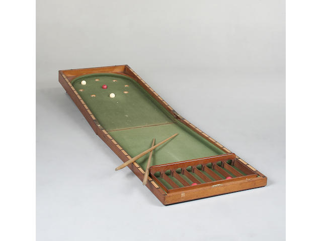 An early 20th Century mahogany bagatelle table,