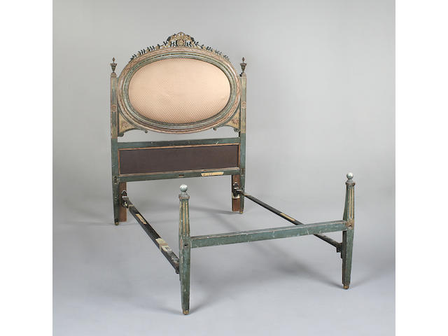 An Italian green painted and polychrome decorated bed,