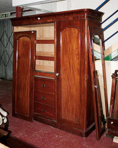 A mid Victorian mahogany triple wardrobe