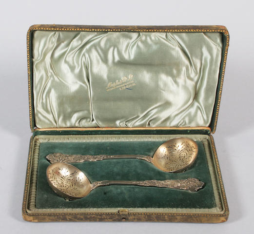 A pair of French parcel gilt sifter ladles circa 1900,