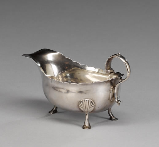 A George III Irish Provincial silver sauceboat, by William Reynolds, maker's mark and "Sterling" only, Cork circa 1760,