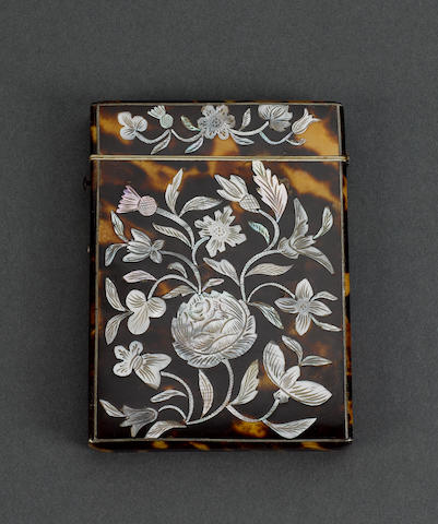 An early 19th century tortoiseshell and mother of pearl inlaid card case