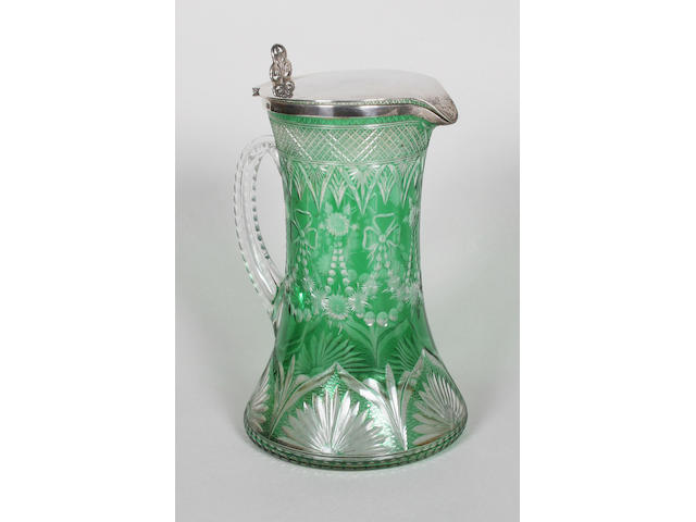 A Stourbridge green flashed and cut glass silver mounted claret jug Circa 1901