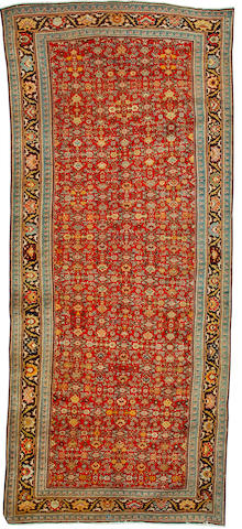 A Karabagh carpet South Caucasus, 15 ft 5 in x 6 ft 7 in (470 x 200 cm) some minor restoration