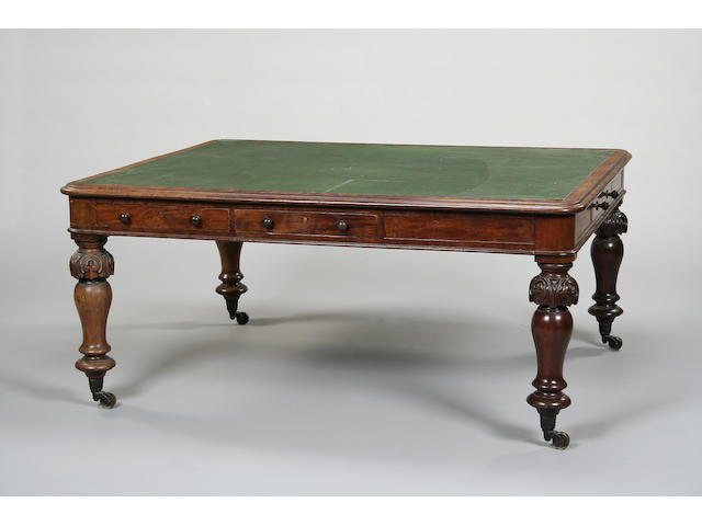A Victorian mahogany library table