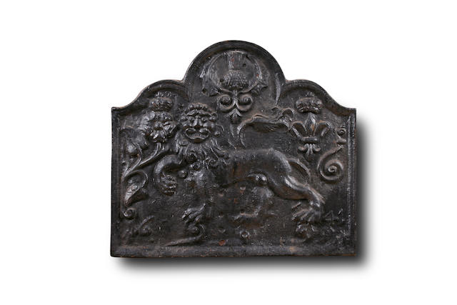 A dated second quarter 17th Century cast iron fire back