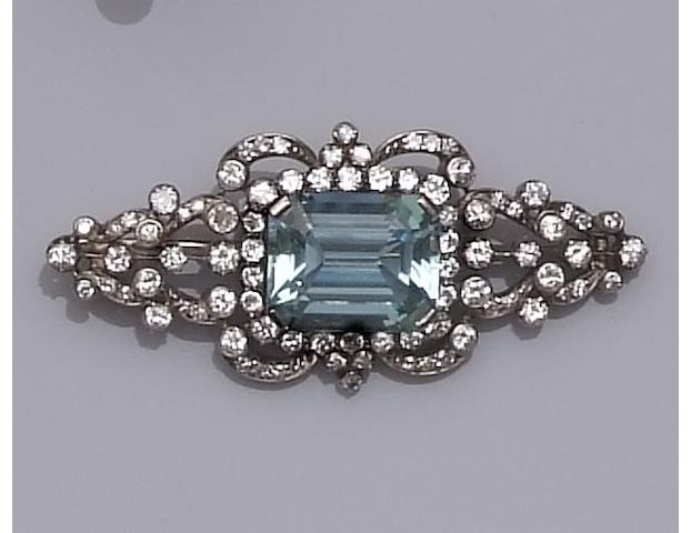 An aquamarine and diamond set brooch
