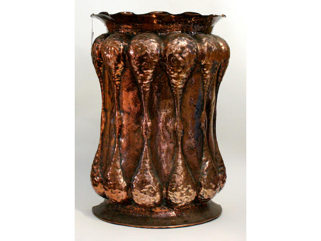 An Arts & Craft copper stick stand, unmarked