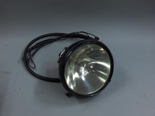 A Miller No 76E 7" headlamp,
