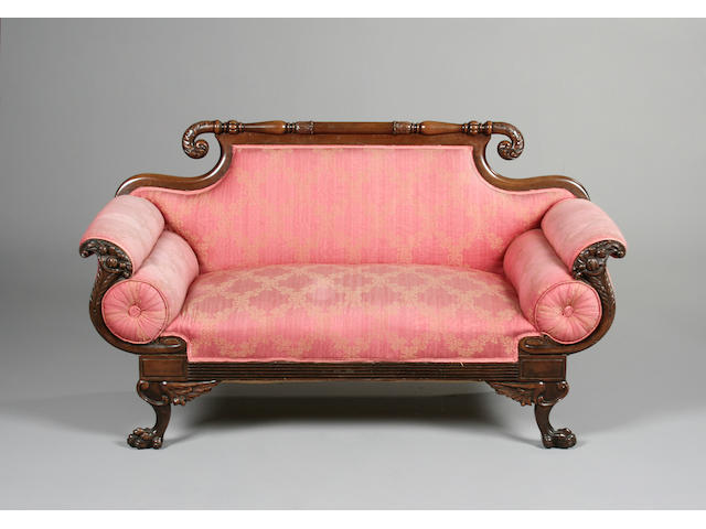 A 19th century American carved walnut sofa