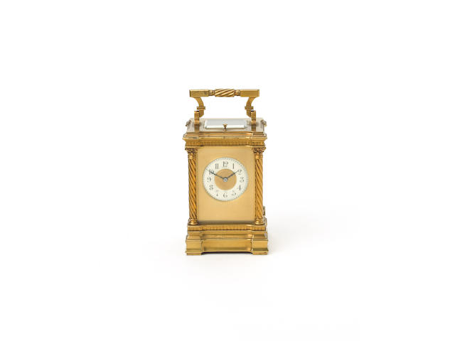 An early 20th Century French repeating carriage clock, retailed by Maple and Co.