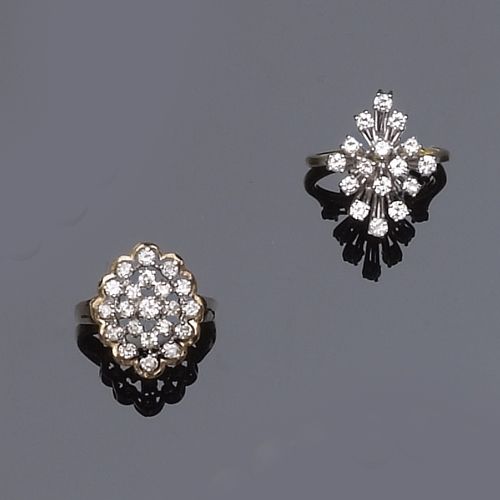 A stylized diamond cluster ring (2)