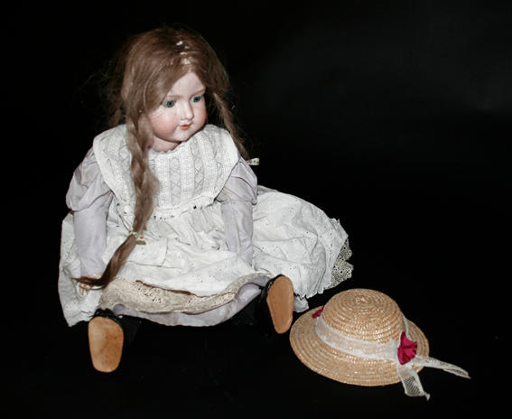 An Armand Marseille bisque head doll,