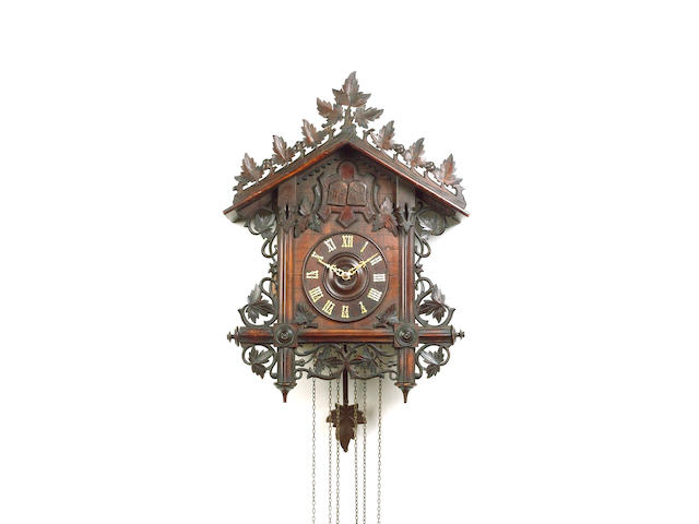 A late 19th Century Black Forest quarter striking Cuckoo and Quail clock,