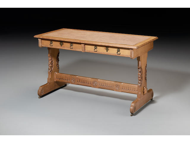 A mid Victorian carved oak Writing Tableby Crace and Sons, the design probably by A.W.N Pugin