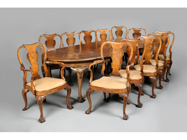 A good early 20th century walnut dining suite in the 18th century style