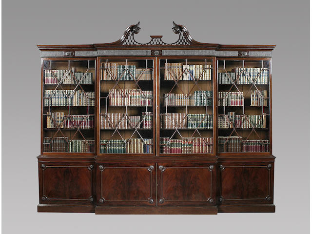 A large George III style mahogany breakfront library bookcase