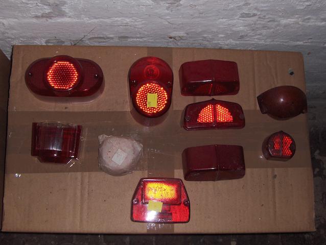 A selection of largely believed NOS tail-lamp lenses. (12)