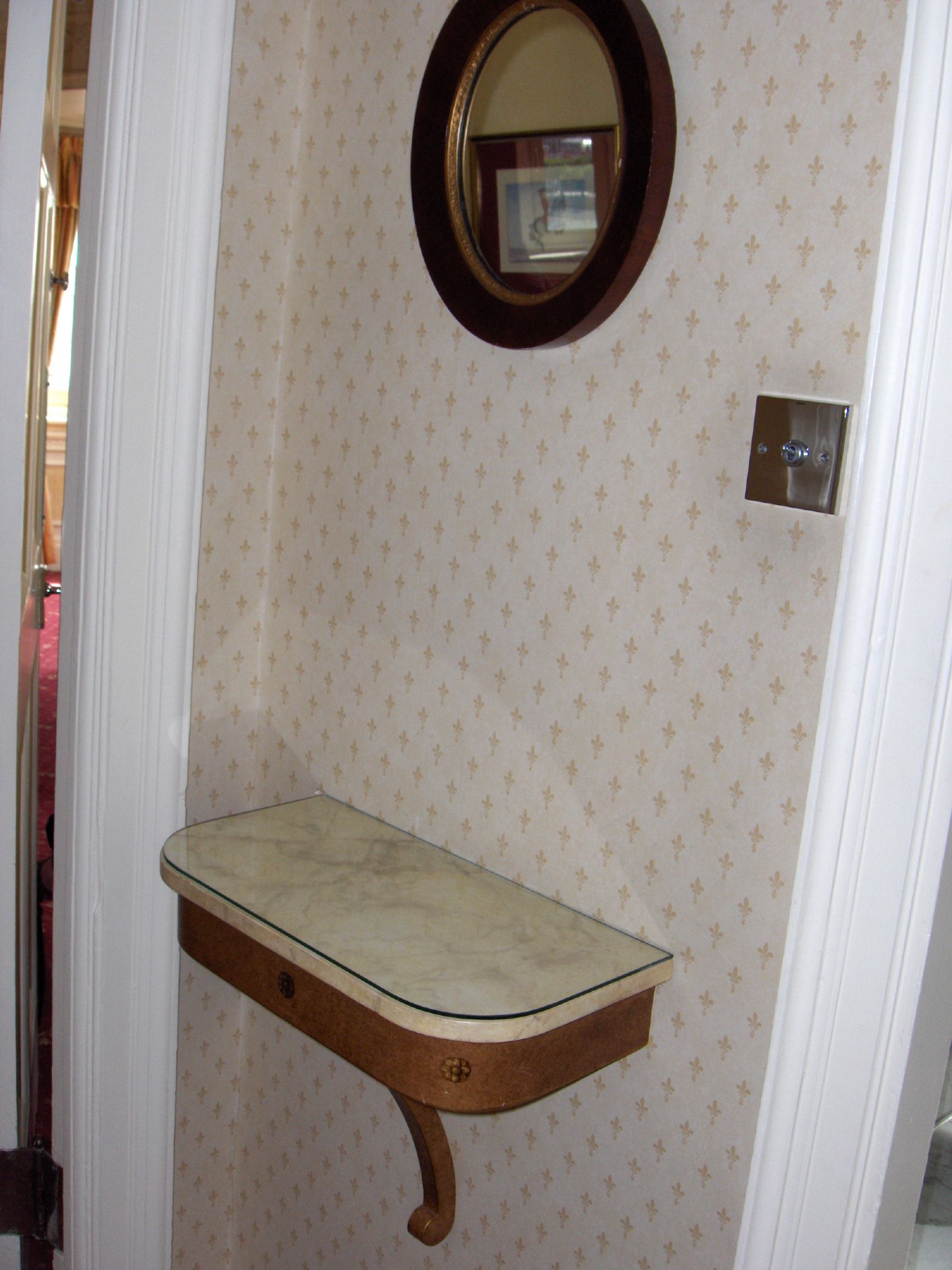 A painted wall mounted console table