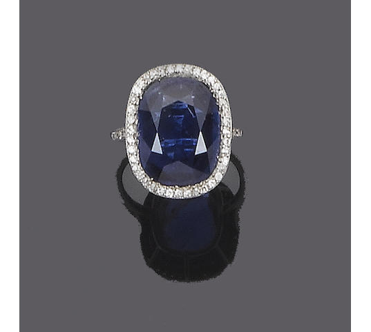 An early 20th century sapphire and diamond cluster ring,