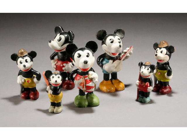 A collection of seven Japanese porcelain Mickey Mouse figures