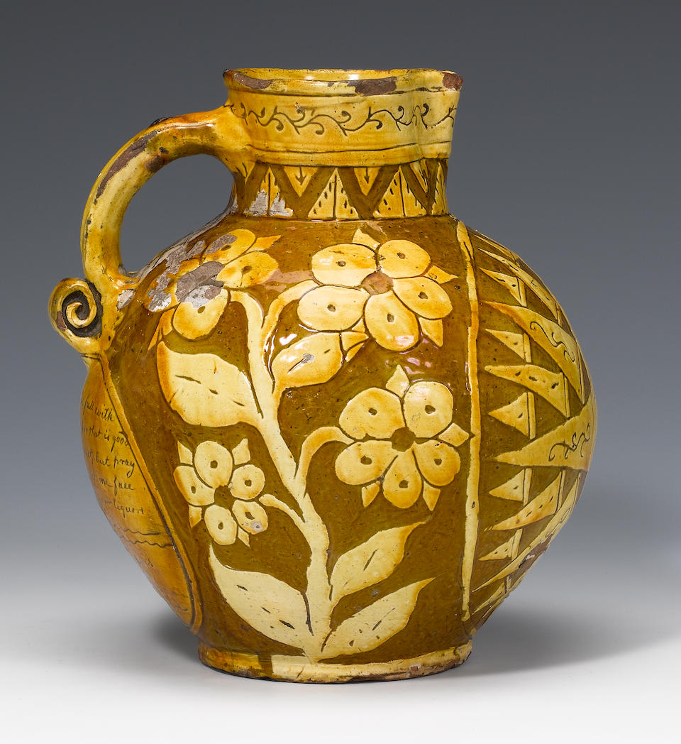 A dated Barnstaple slipware harvest jug dated 1812