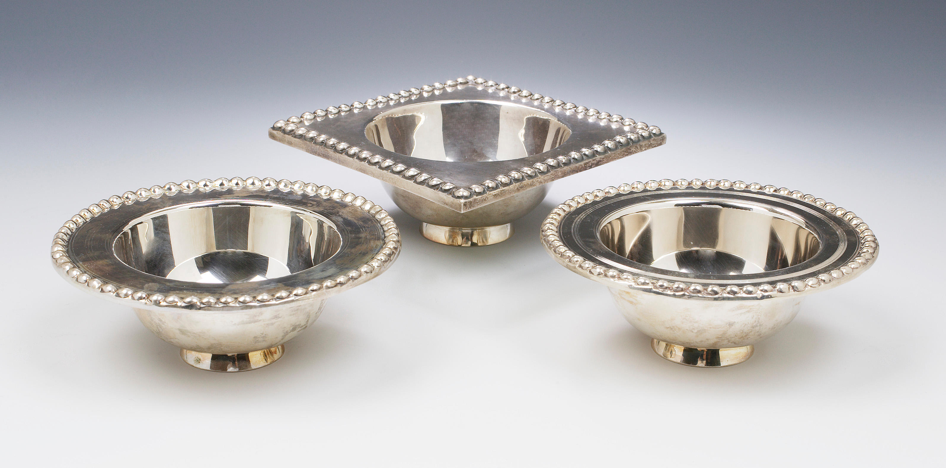 A matched pair of Traprain Treasure reproduction bowls