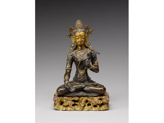 A Tibetan/Himalayan bronze figure of a female Bodhisattva or deity;