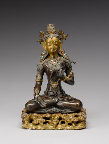 A Tibetan/Himalayan bronze figure of a female Bodhisattva or deity;
