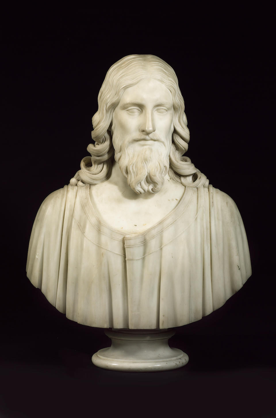 Hiram Powers (American, 1805-1873): A sculpted white marble Bust of Christ