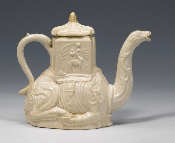 A rare Staffordshire saltglaze camel teapot and cover mid 18th century