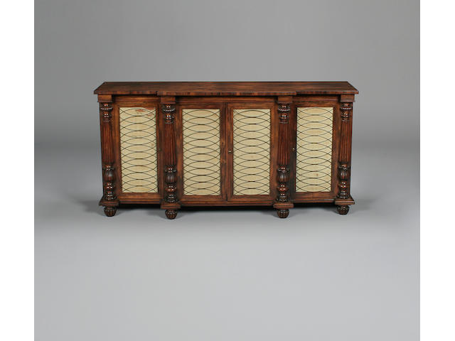 A rosewood breakfront side cabinet