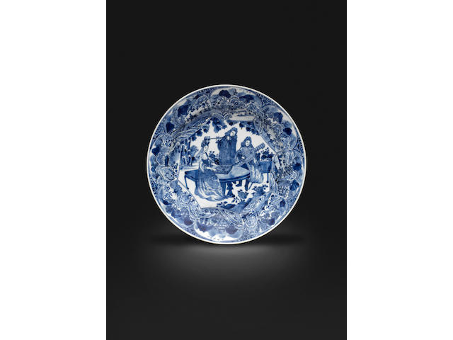 A fine and rare blue and white 'Music Party' dish Early 18th century