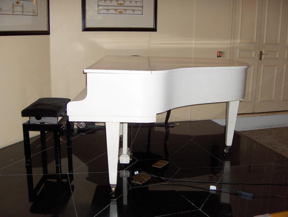 A 5ft 4in Model 160 grand piano