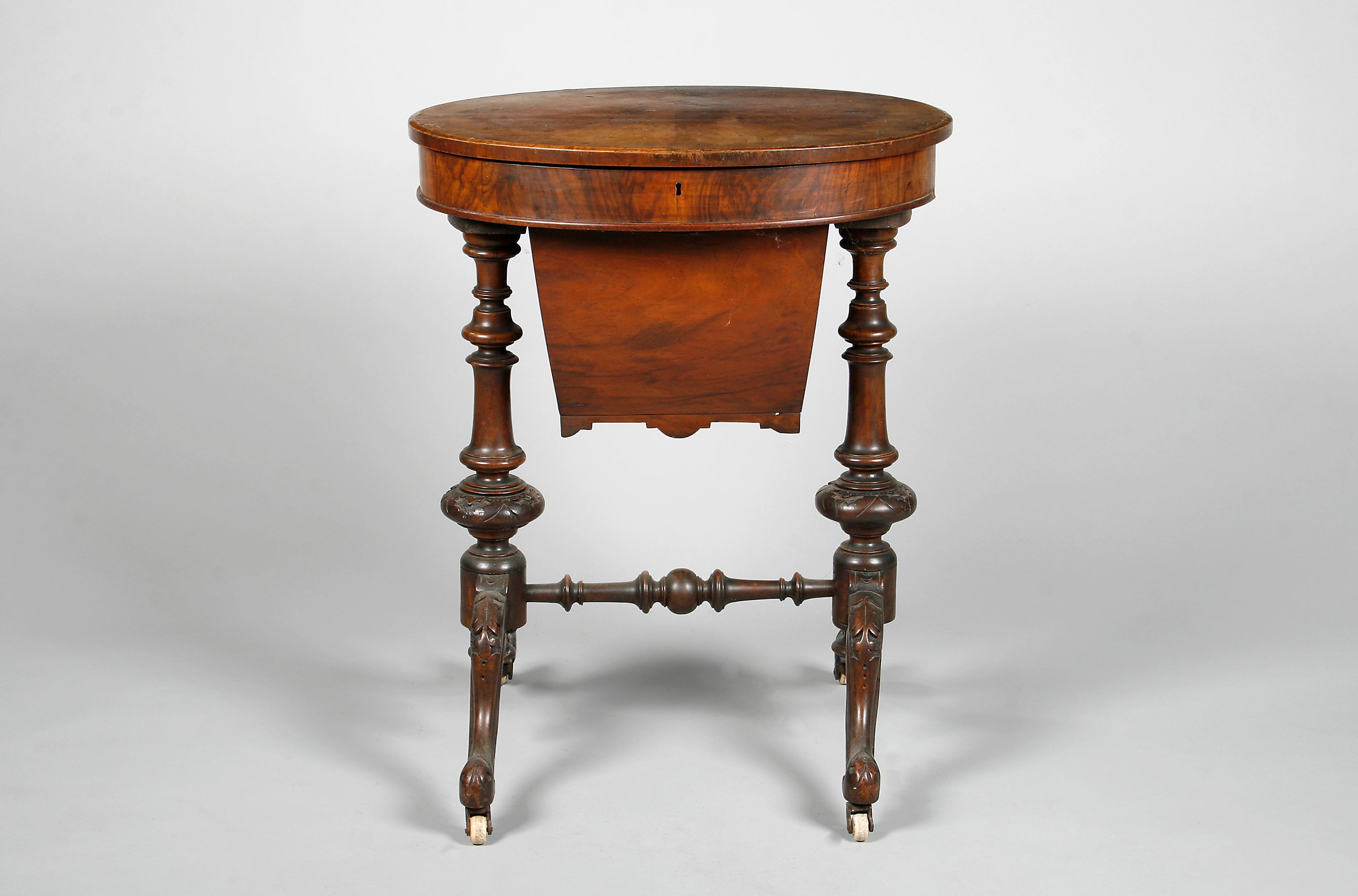 A Victorian walnut work table