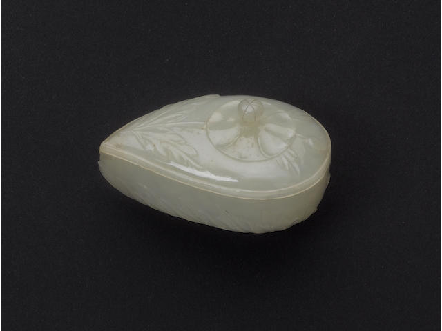 A Mughal jade box and cover of boteh/leaf form;