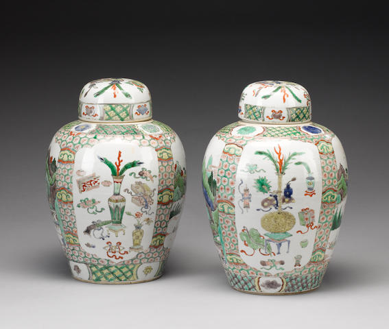 A matched pair of famille verte oviform vases;