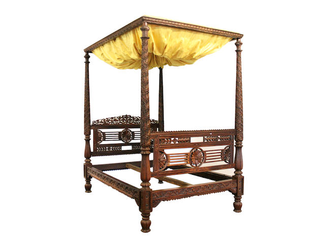 An Anglo Indian carved padouk tester bed, 19th Century