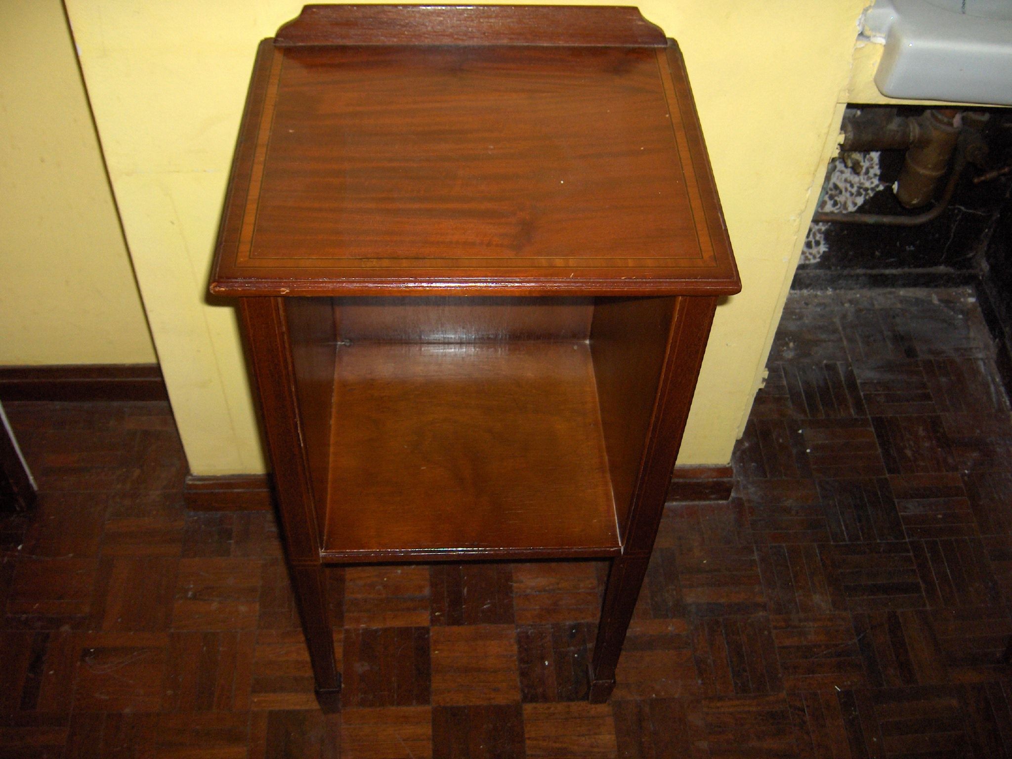 A mahogany rectangular bedside table