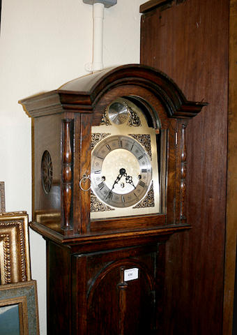 A dwarf longcase clock