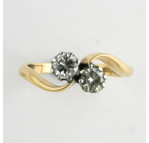 A two stone diamond crossover ring,