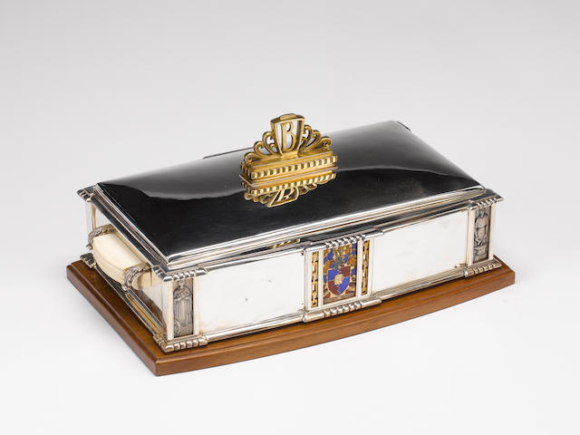 A. E. JONES : A silver, silver-gilt and enamelled cigar box in the form of a freedom casket, Birmingham 1959,