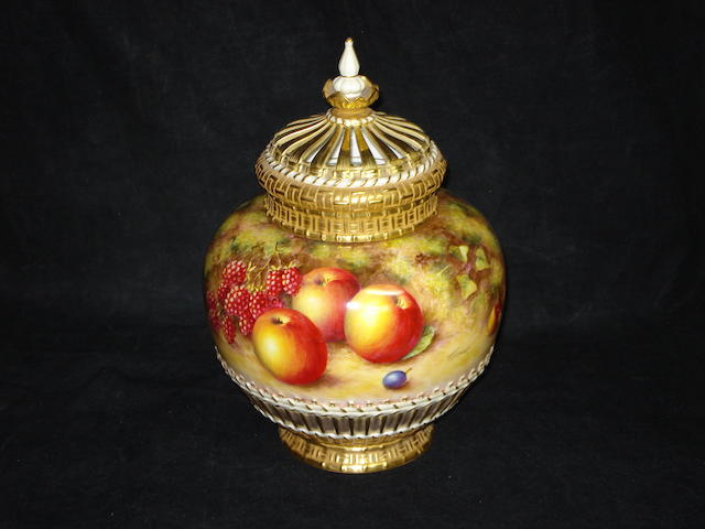A Royal Worcester fruit painted rose jar and covers by John Freeman, post-war
