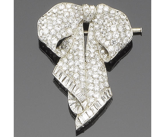 A diamond bow brooch,