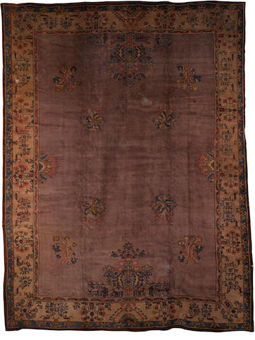 An Ushak carpet West Anatolia, 15 ft 8 in x 11 ft 10 in (477 x 361 cm) some damage